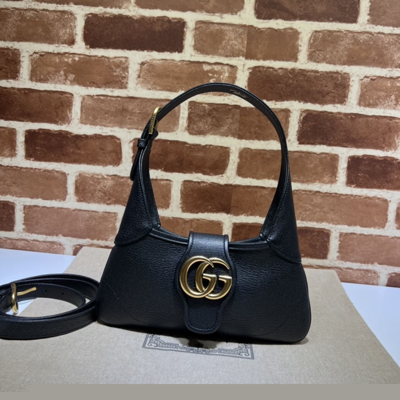 G*u*i top handle bags